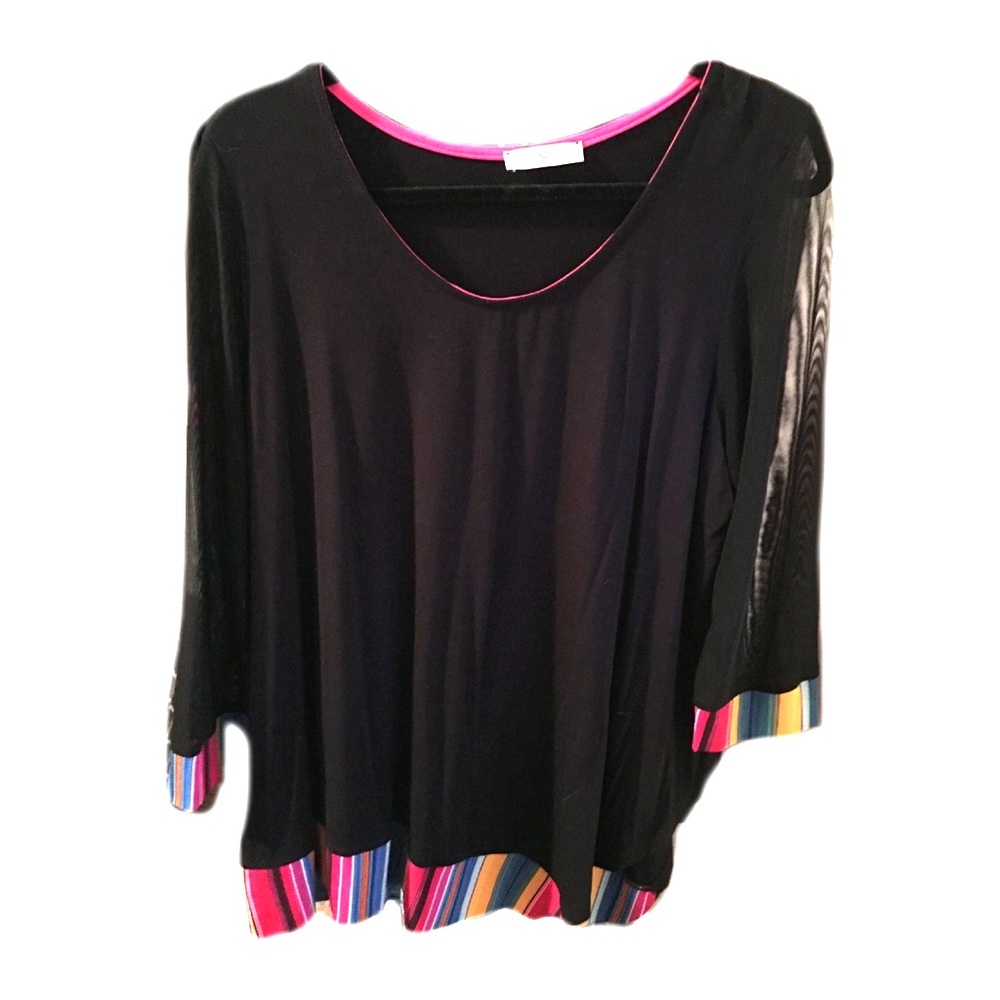 Fun tunic with interesting accents!